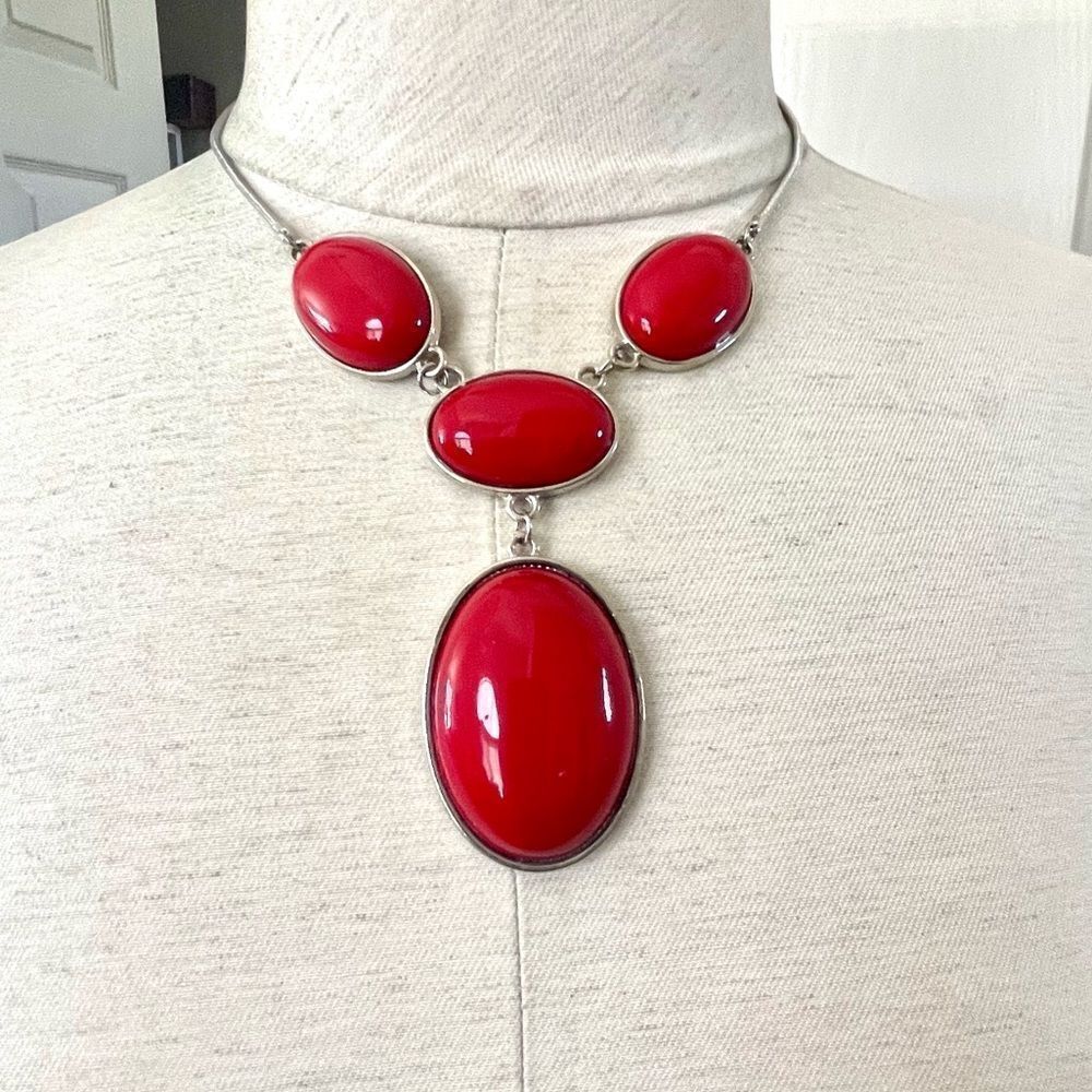 Red silver tone pendant necklace